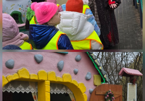 Dzieci stoją przy domku z piernika i przy bramie z książki.